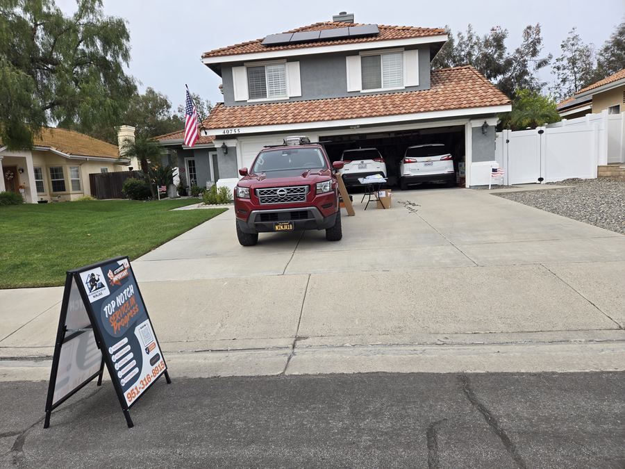 Corona, CA home during the daytime before permanent lighting is turned on