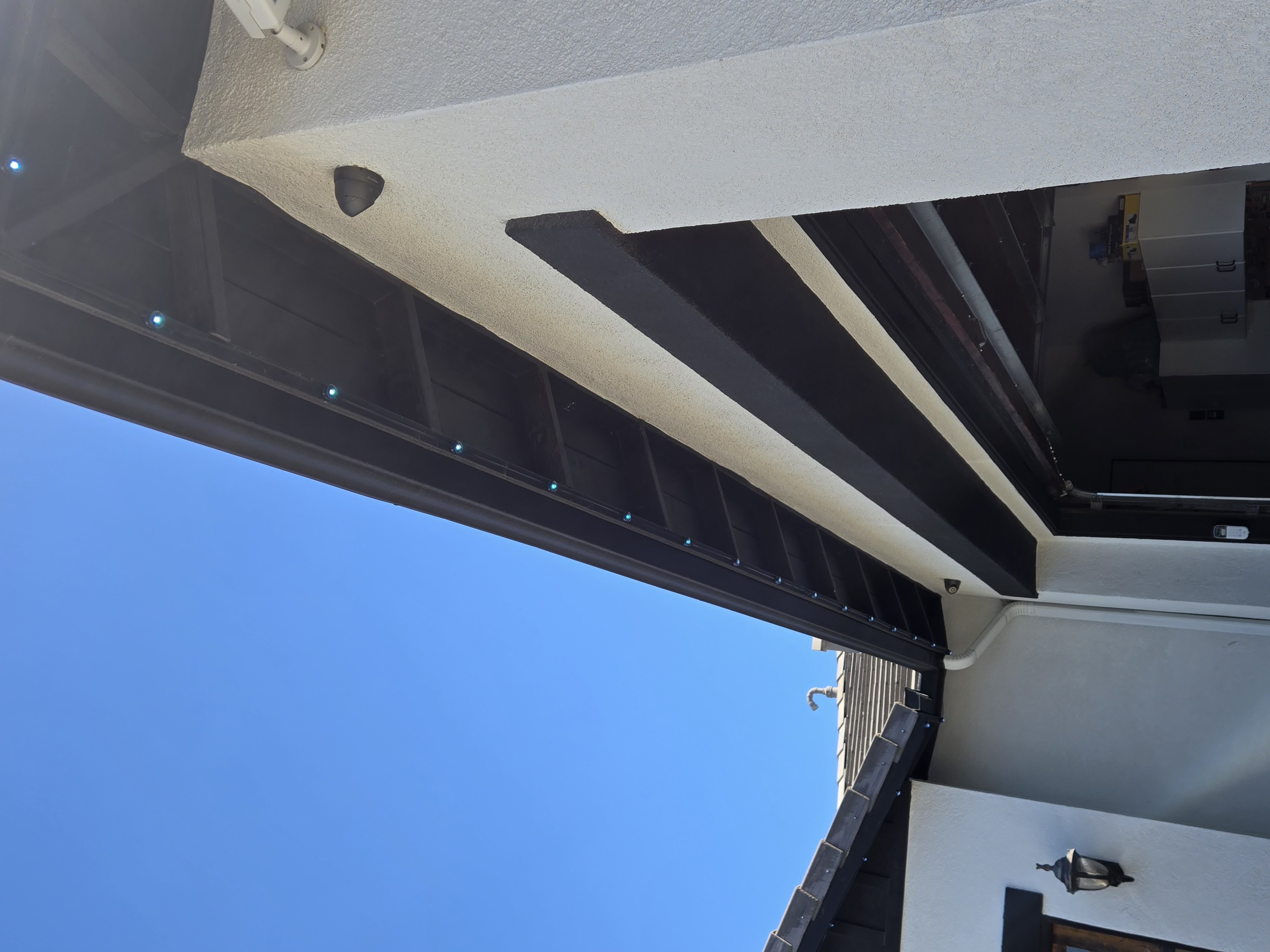 Corona CA home eaves close-up of installed permanent LED lighting channel